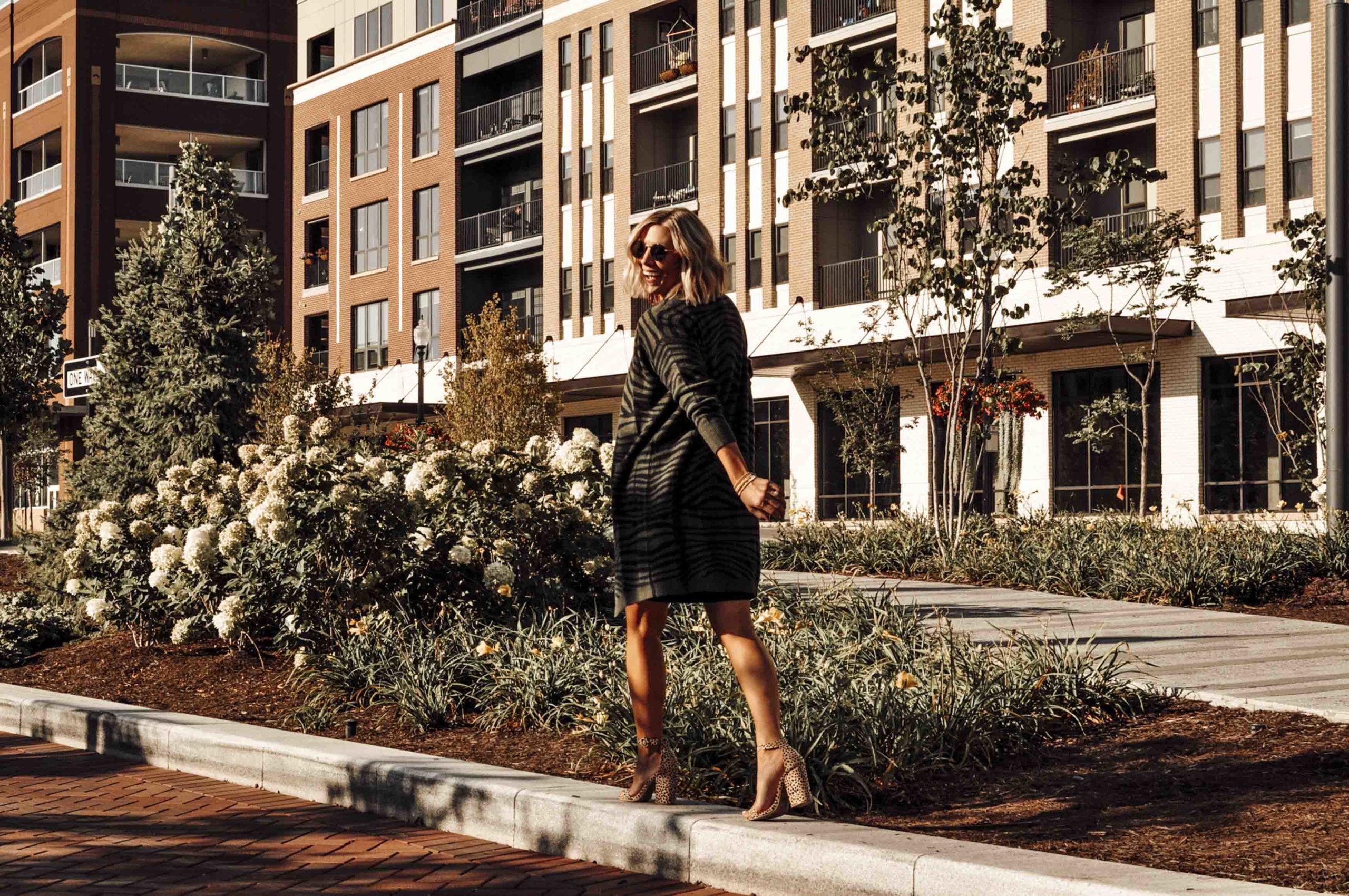 Style blogger Lindsey Weaver wearing her favorite green cardigan for fall.